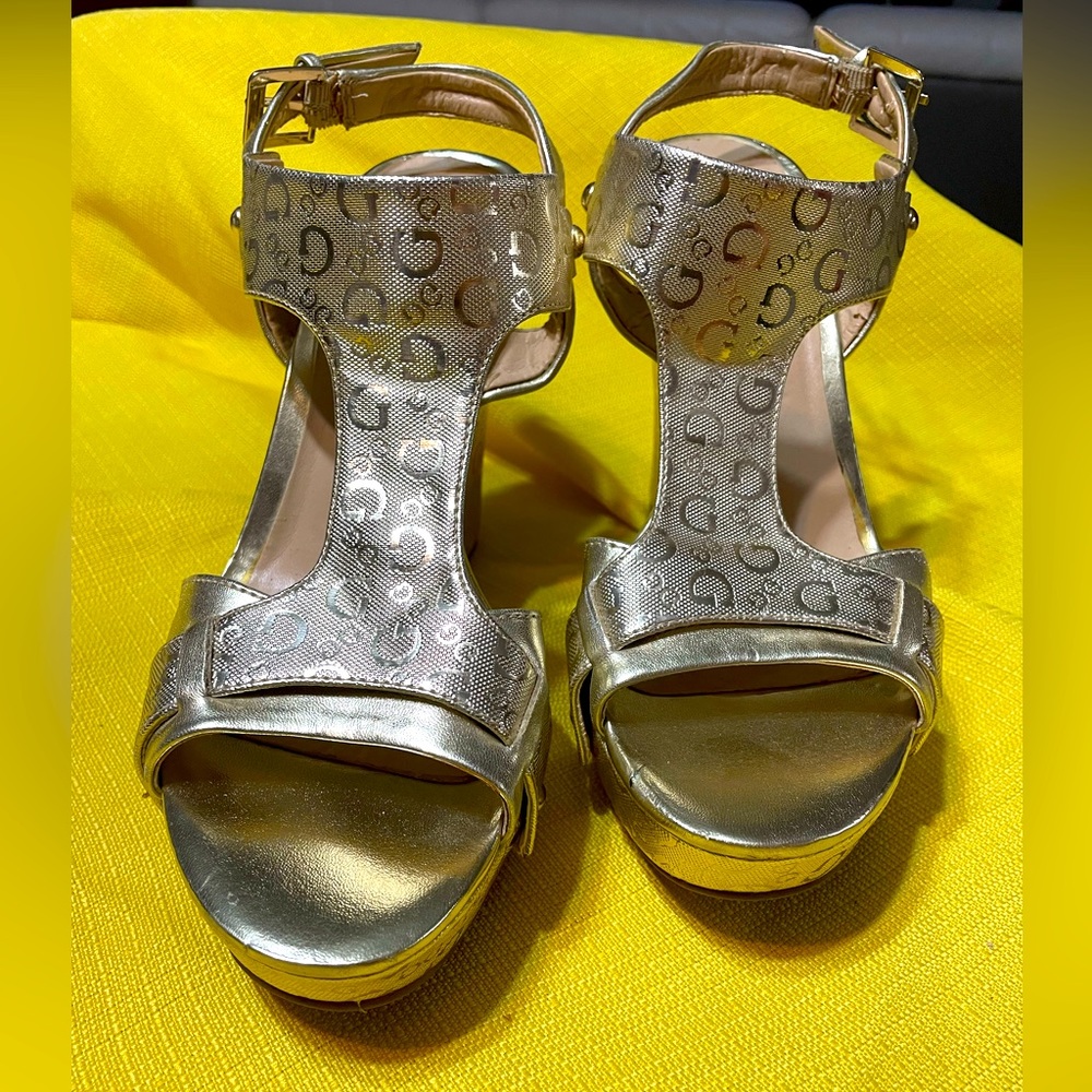 Guess Metallic Gold Wedges. Size 8.5. Used. Good condition.